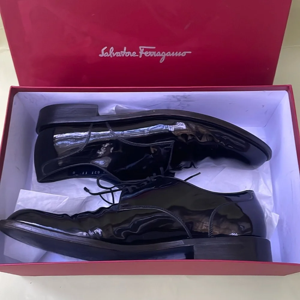 Dark blue Salvatore Ferragamo patent leather shoes in box
